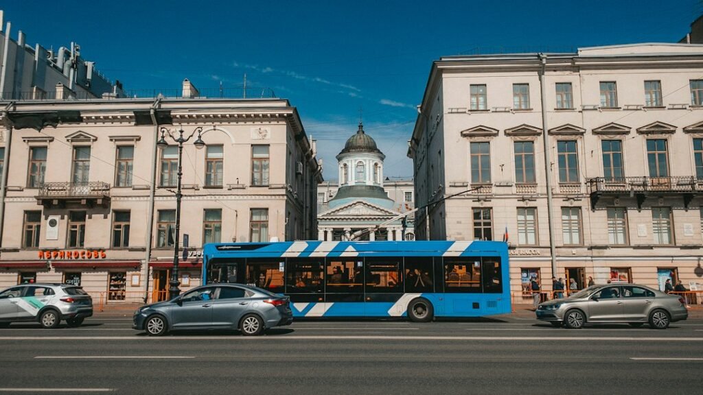 City bus driving along a road