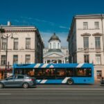 City bus driving along a road