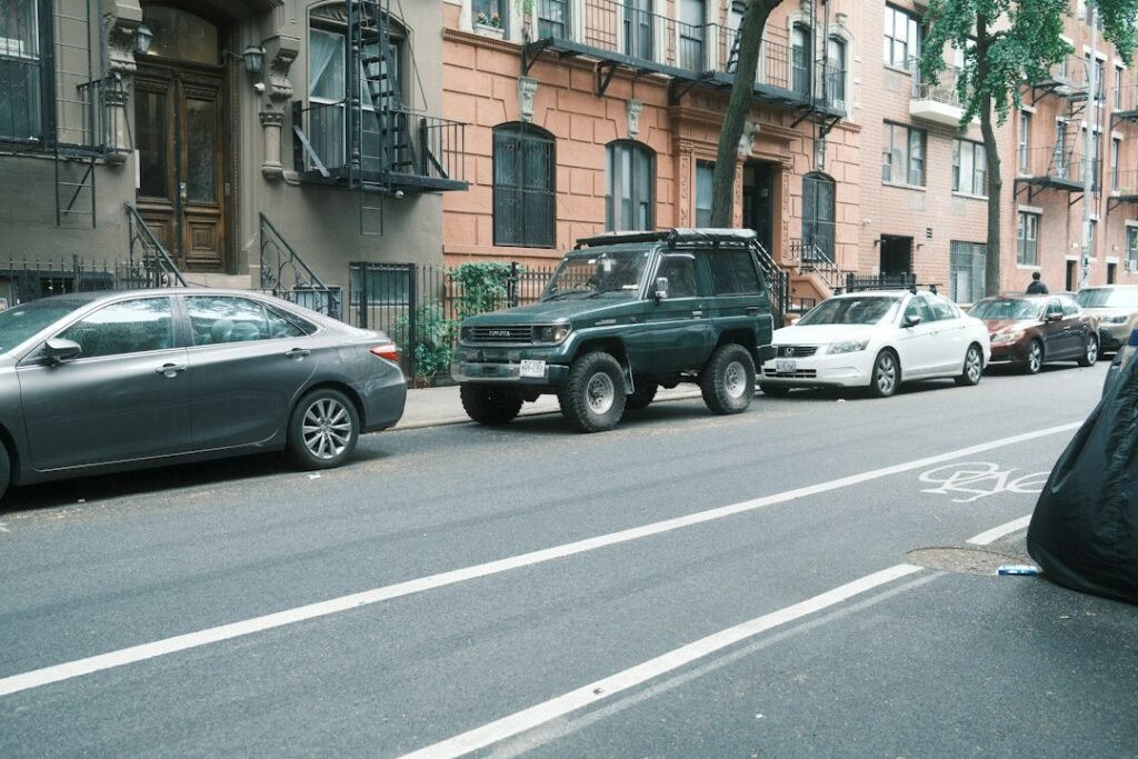 Car parked on a city street illustrating a car driving game