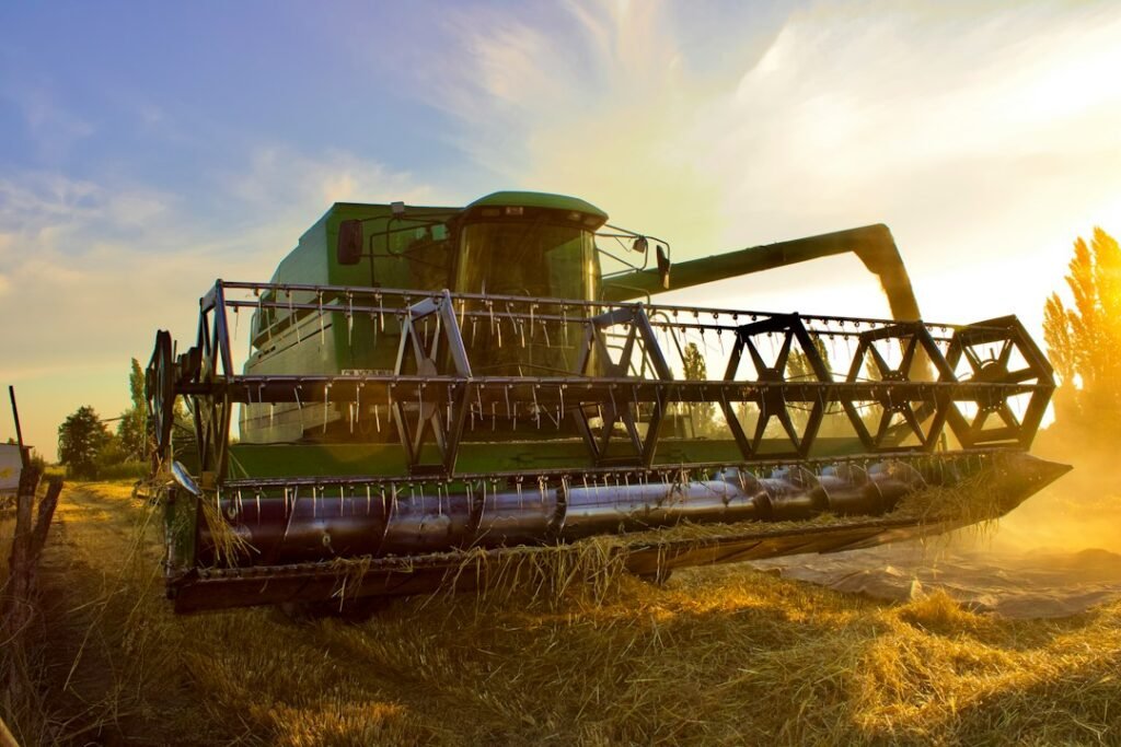 Agricultural machinery in a field illustrating Farming Simulator mobile gameplay