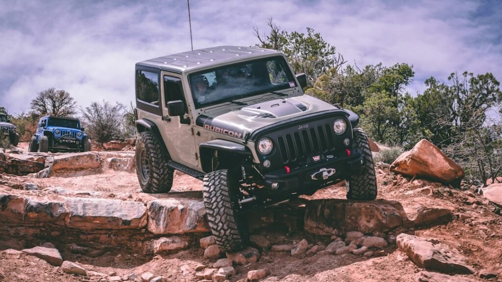 Four-wheel-drive vehicle on rugged terrain illustrating an off-road driving game
