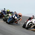 Motorcycle on a curved road used as an illustrative featured image for the Racing Fever Moto Android guide